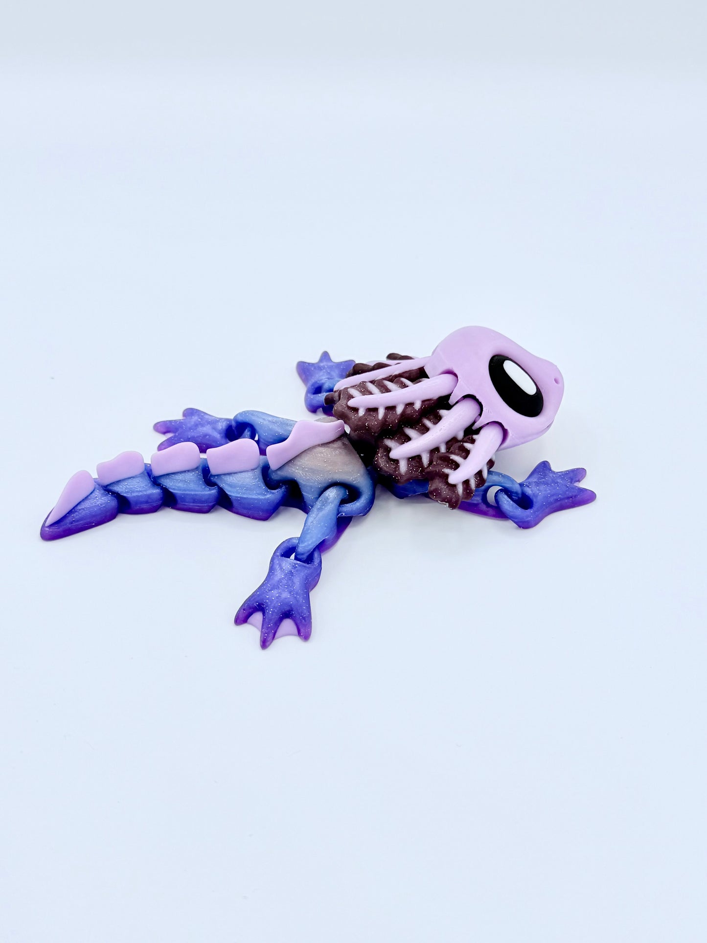 Axolotl with seaweed bed.