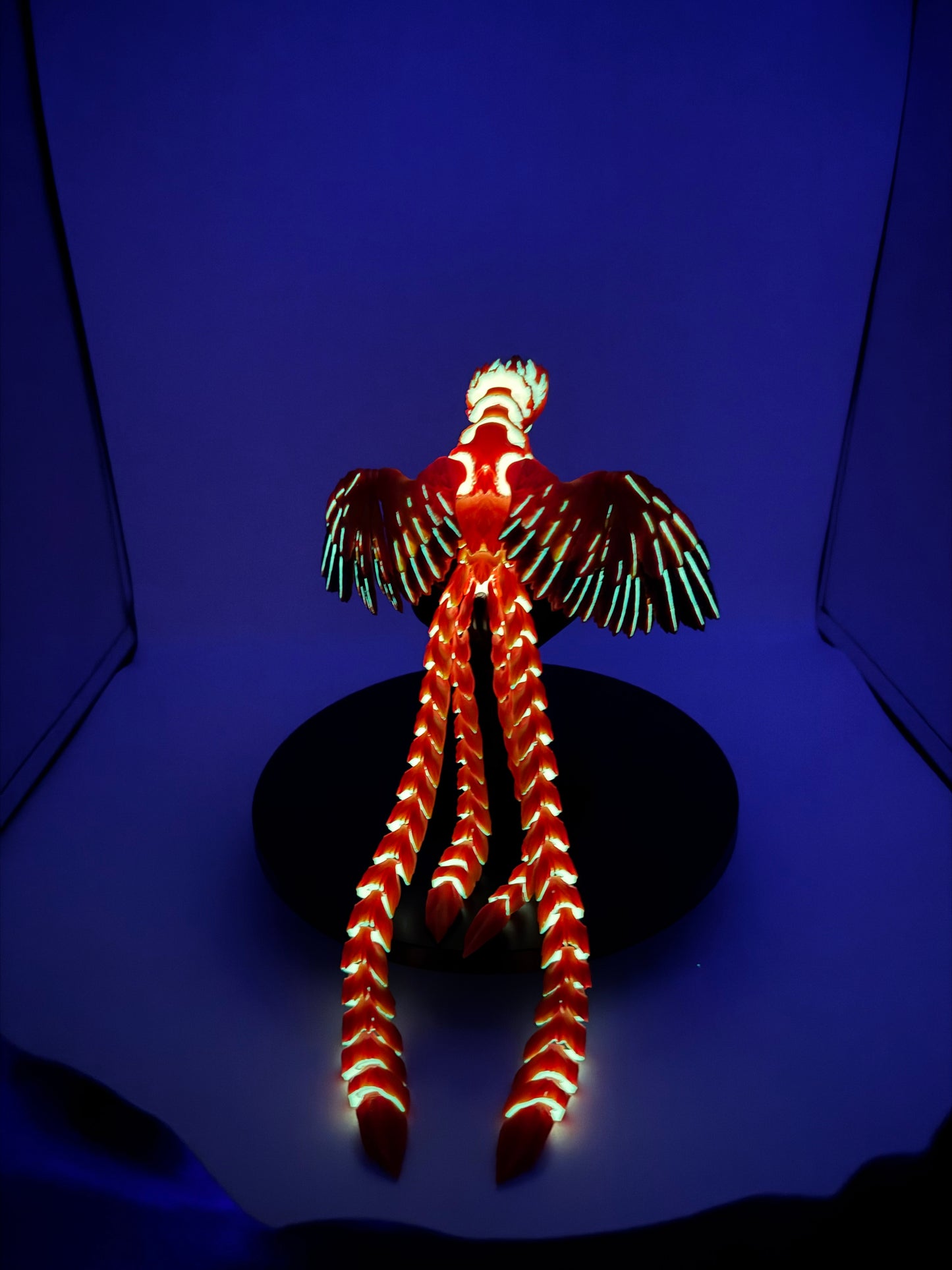 Phoenix for your articulating UV reactive with glow-in-the-dark colors and stand.