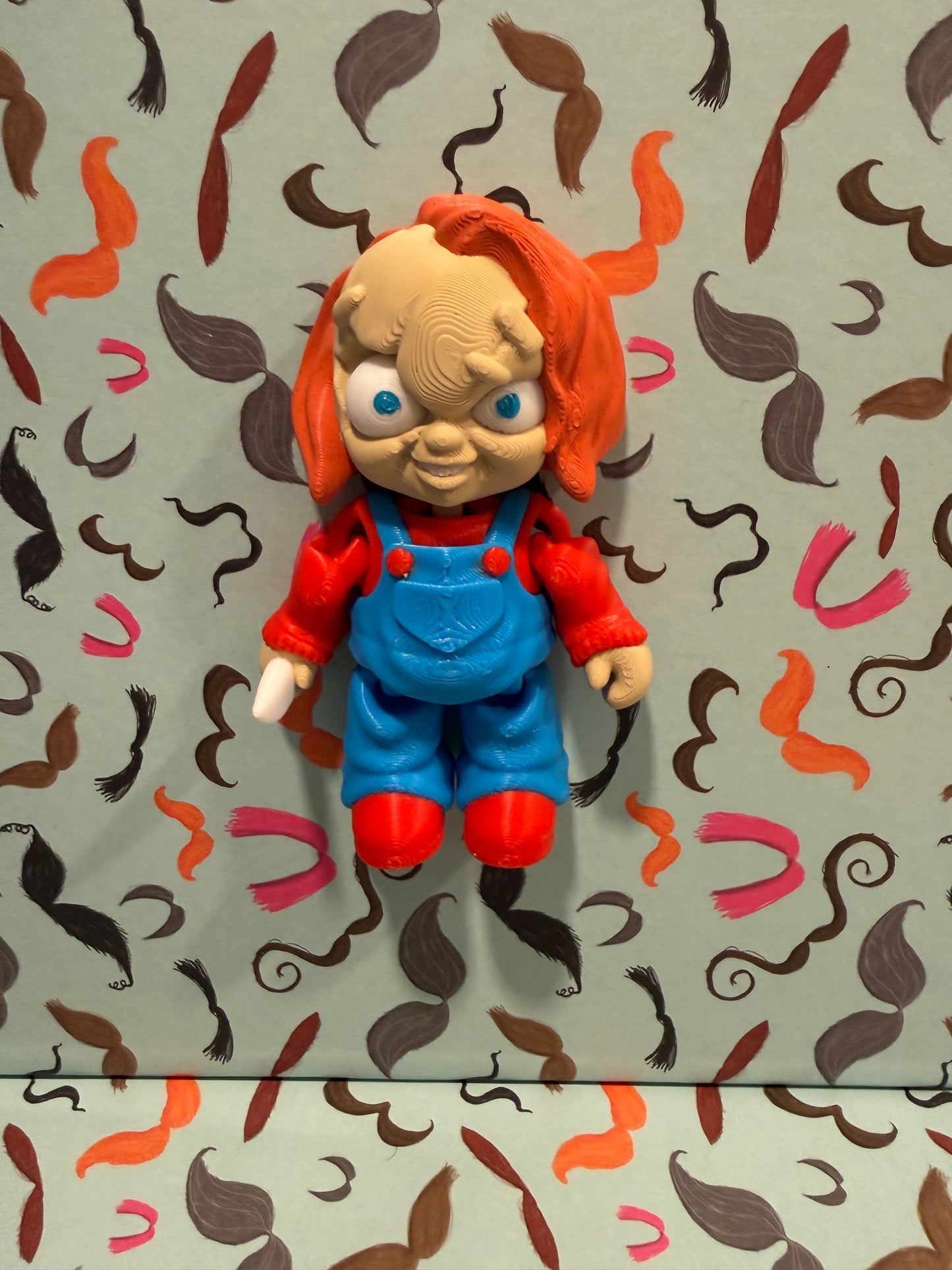 Chucky from child’s play ￼