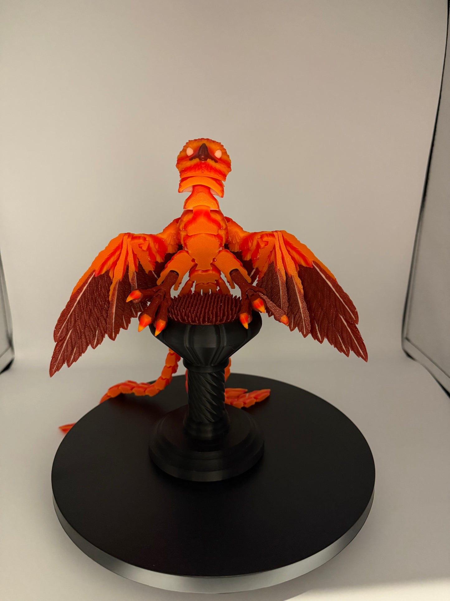 Phoenix for your articulating UV reactive with glow-in-the-dark colors and stand.