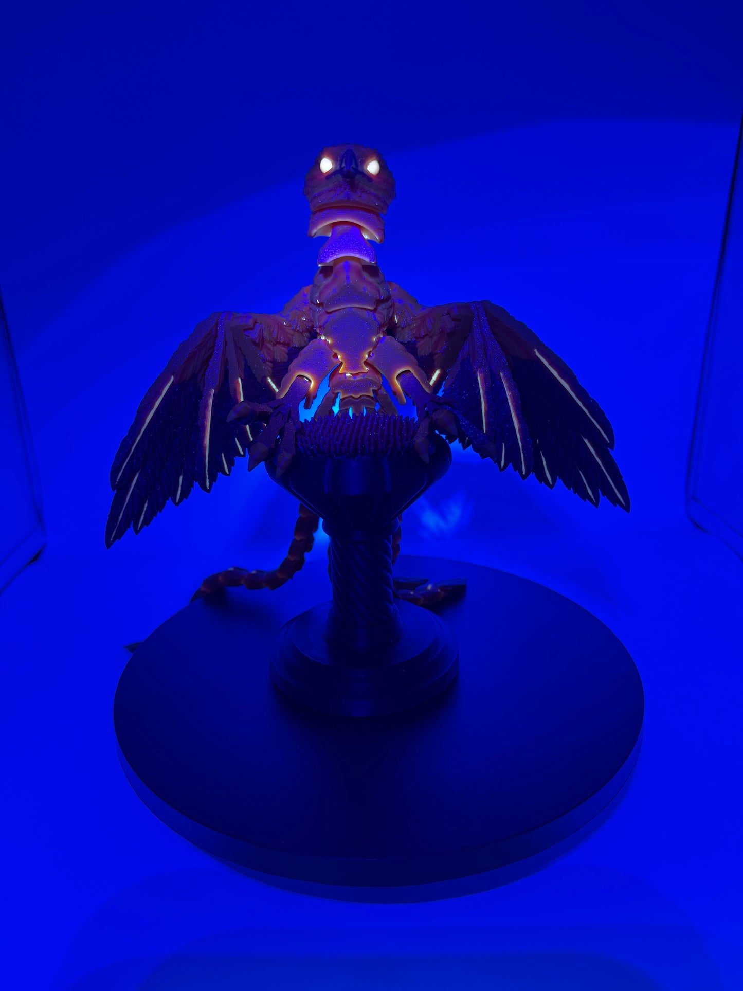 Phoenix for your articulating UV reactive with glow-in-the-dark colors and stand.