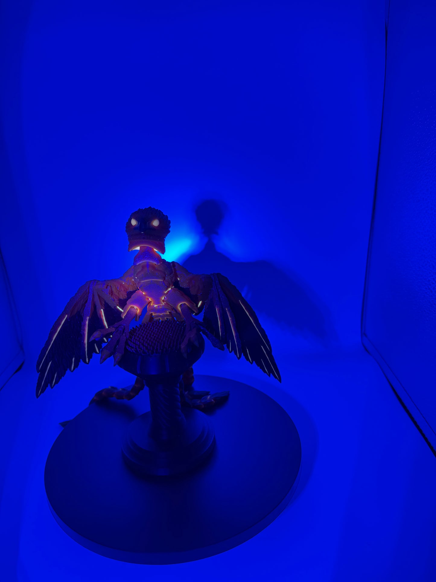 Phoenix for your articulating UV reactive with glow-in-the-dark colors and stand.