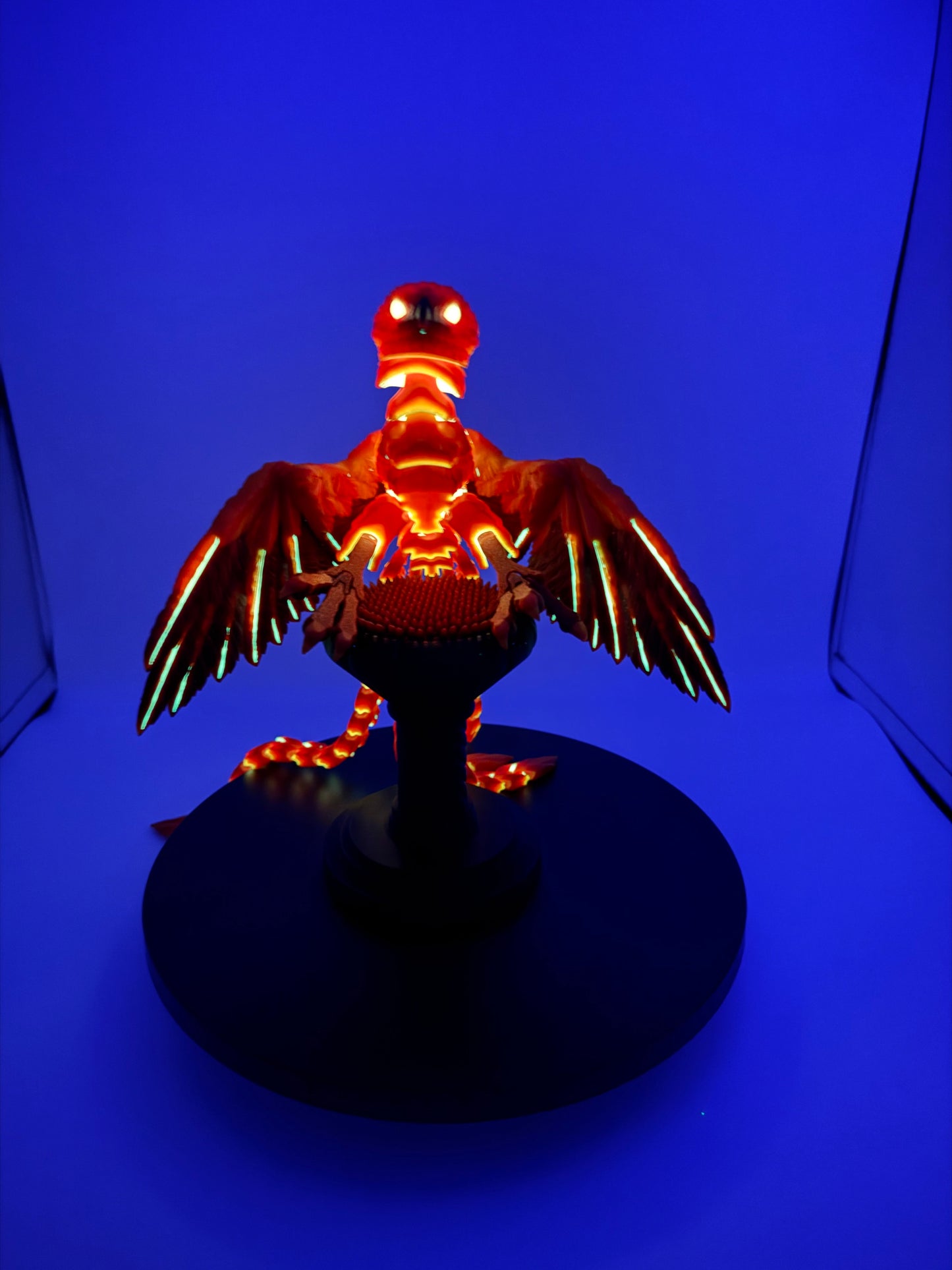 Phoenix for your articulating UV reactive with glow-in-the-dark colors and stand.