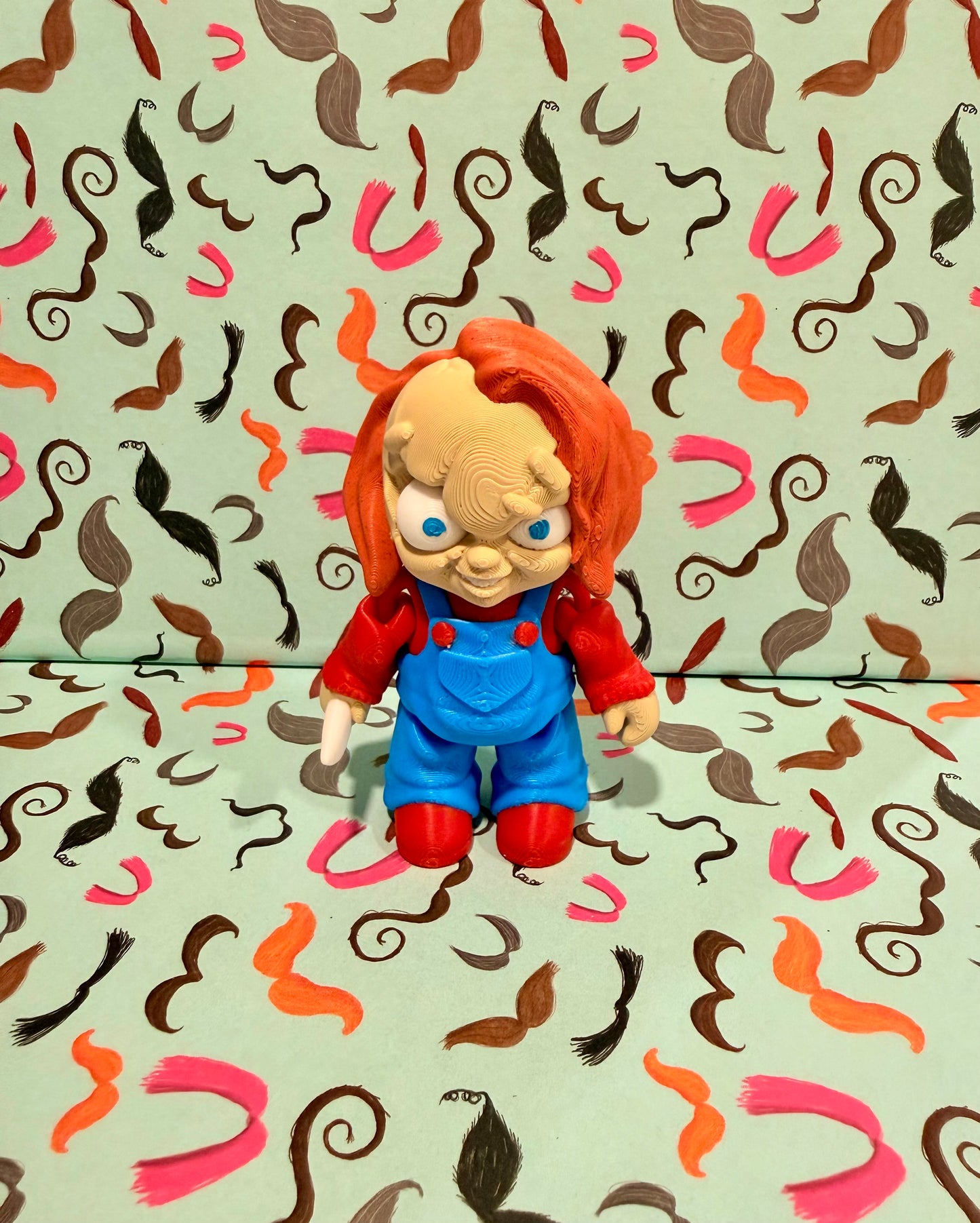 Chucky from child’s play ￼