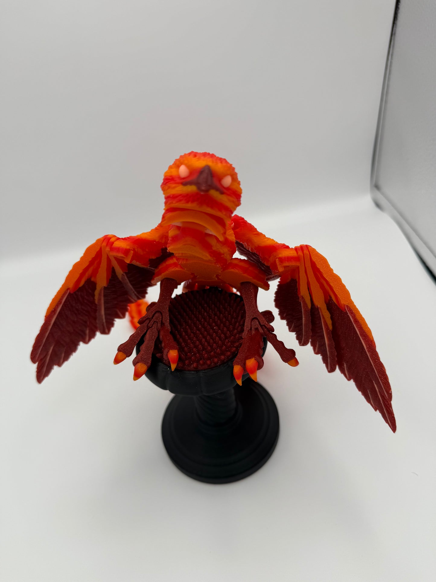 Phoenix for your articulating UV reactive with glow-in-the-dark colors and stand.