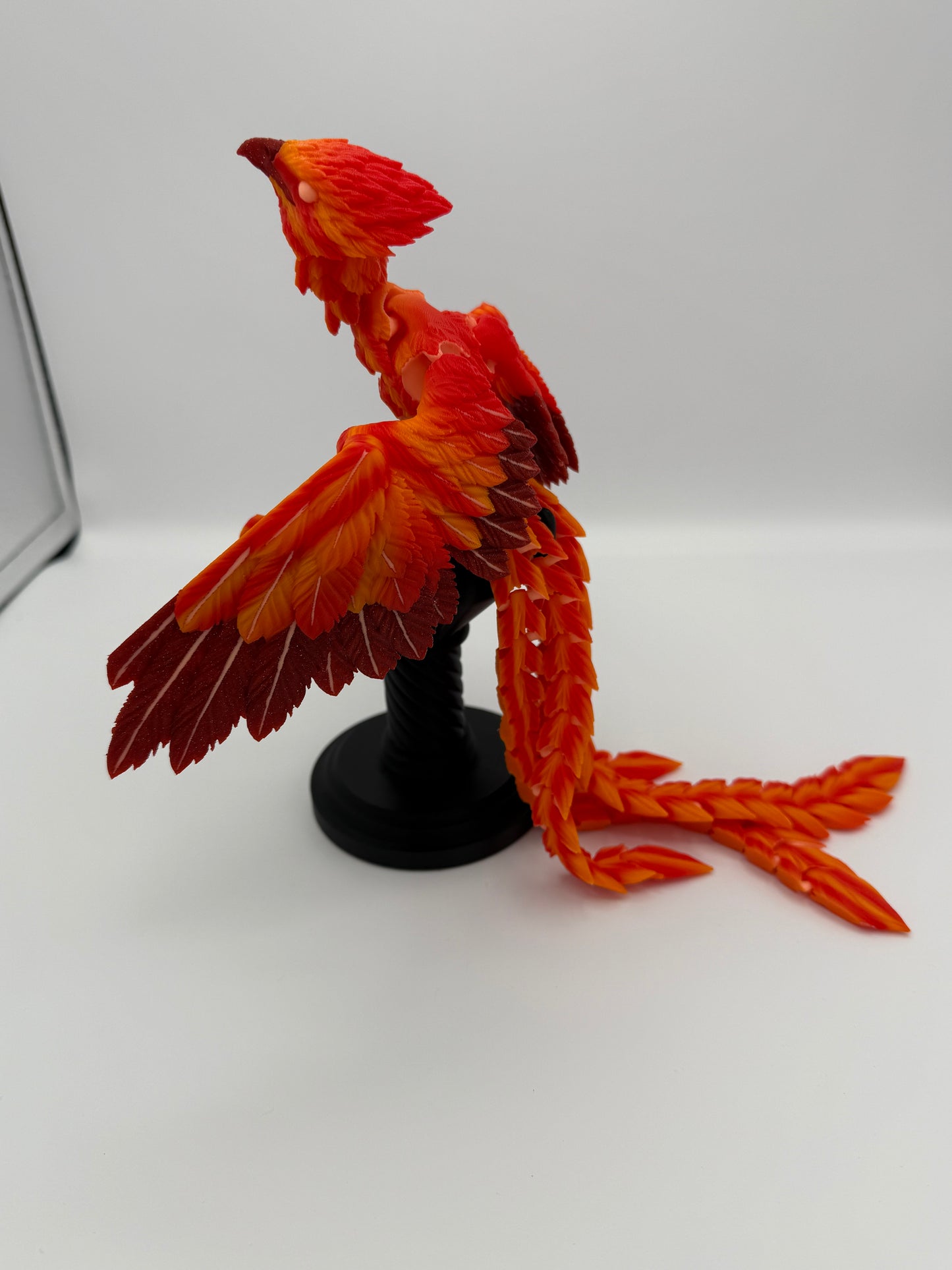 Phoenix for your articulating UV reactive with glow-in-the-dark colors and stand.