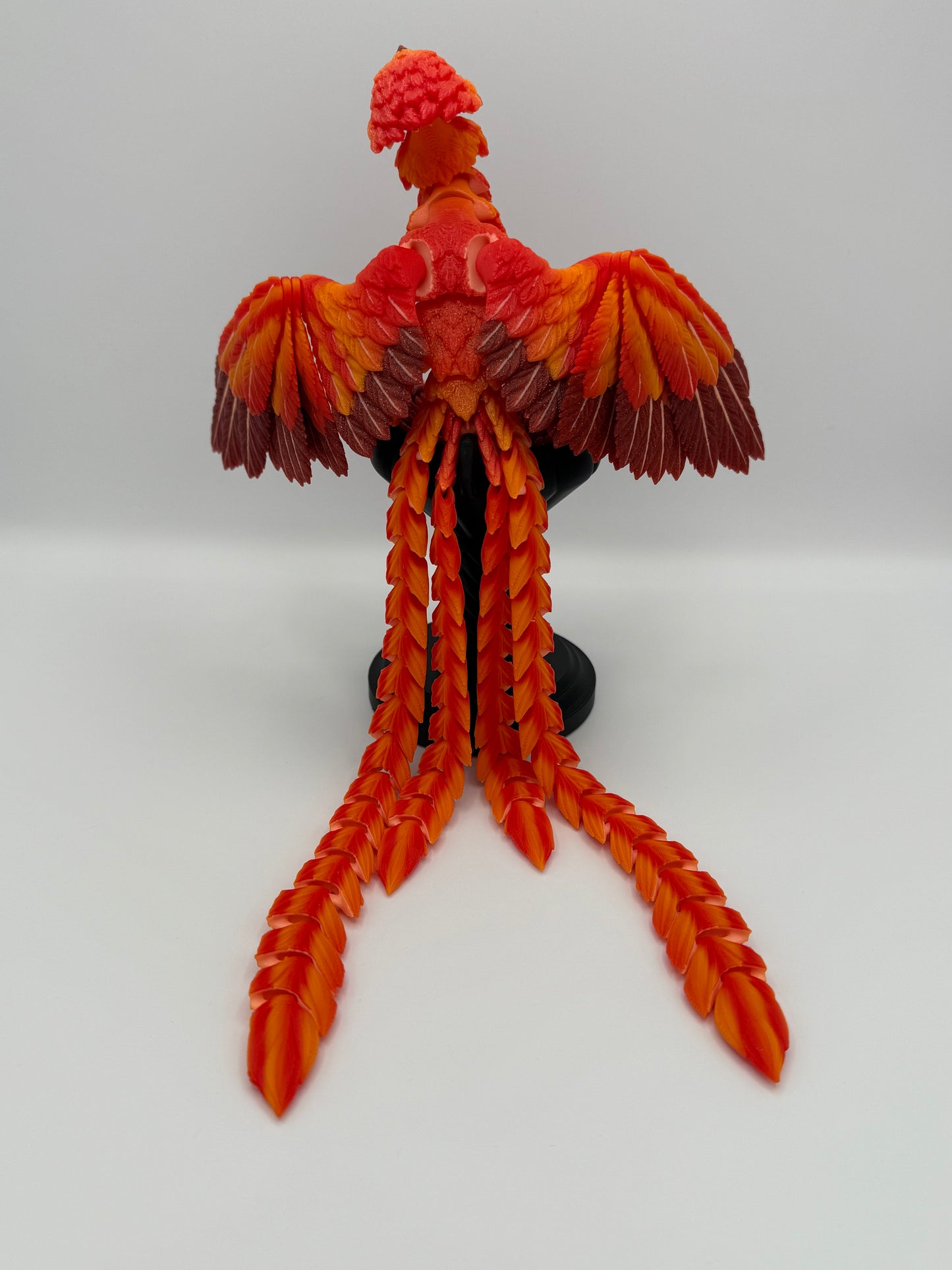 Phoenix for your articulating UV reactive with glow-in-the-dark colors and stand.