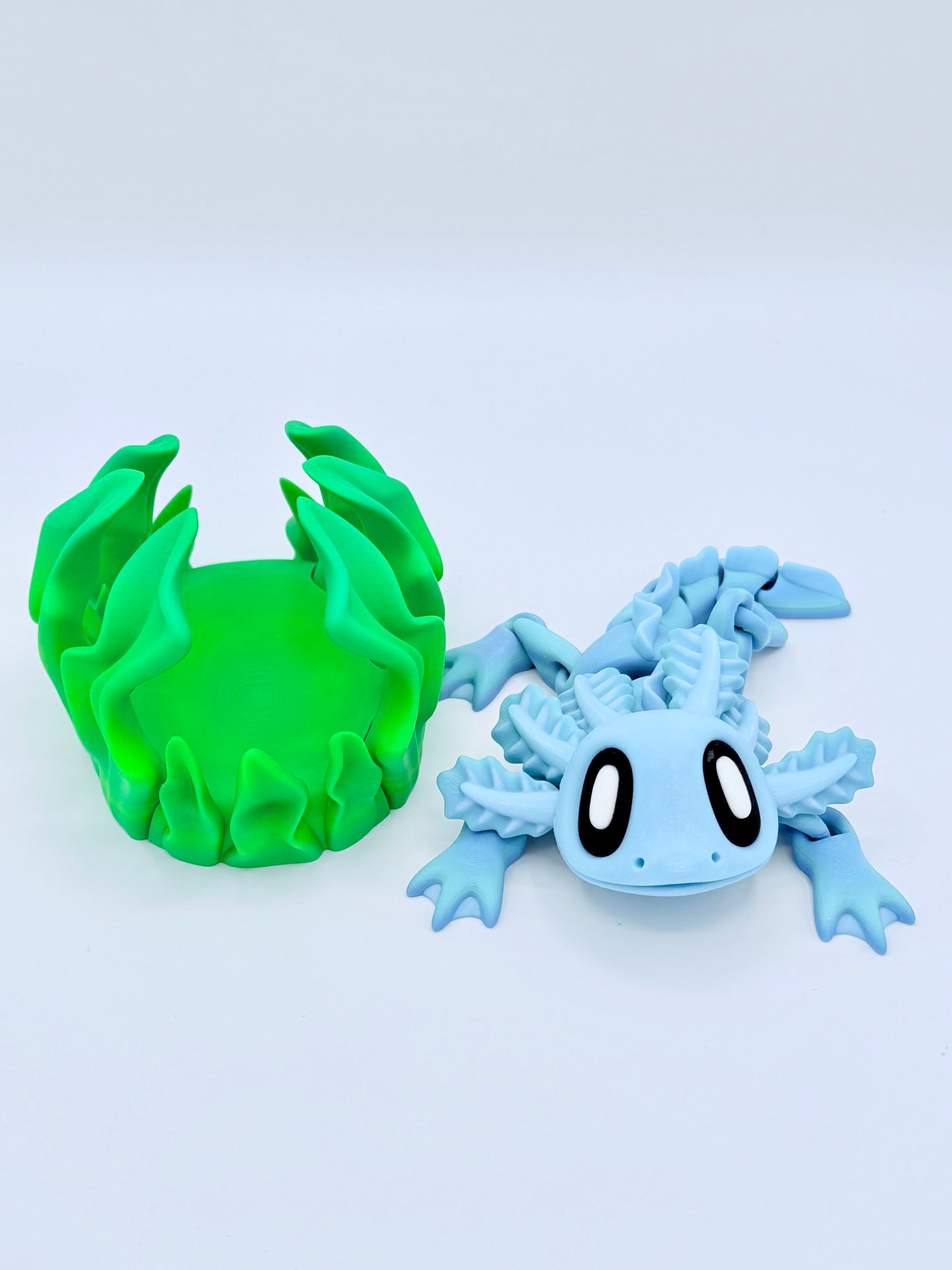 Axolotl with seaweed bed.