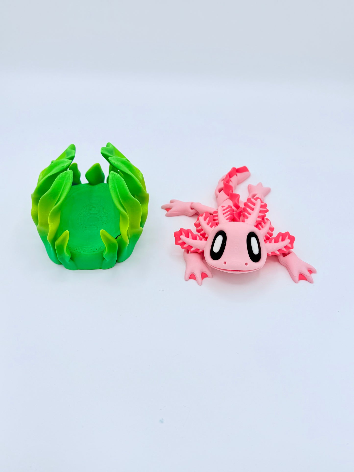 Axolotl with seaweed bed.