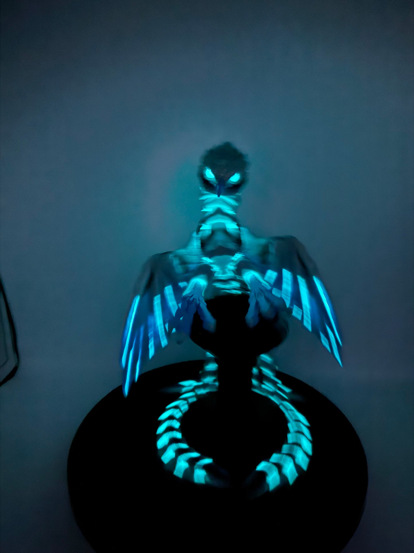 Phoenix for your articulating UV reactive with glow-in-the-dark colors and stand.