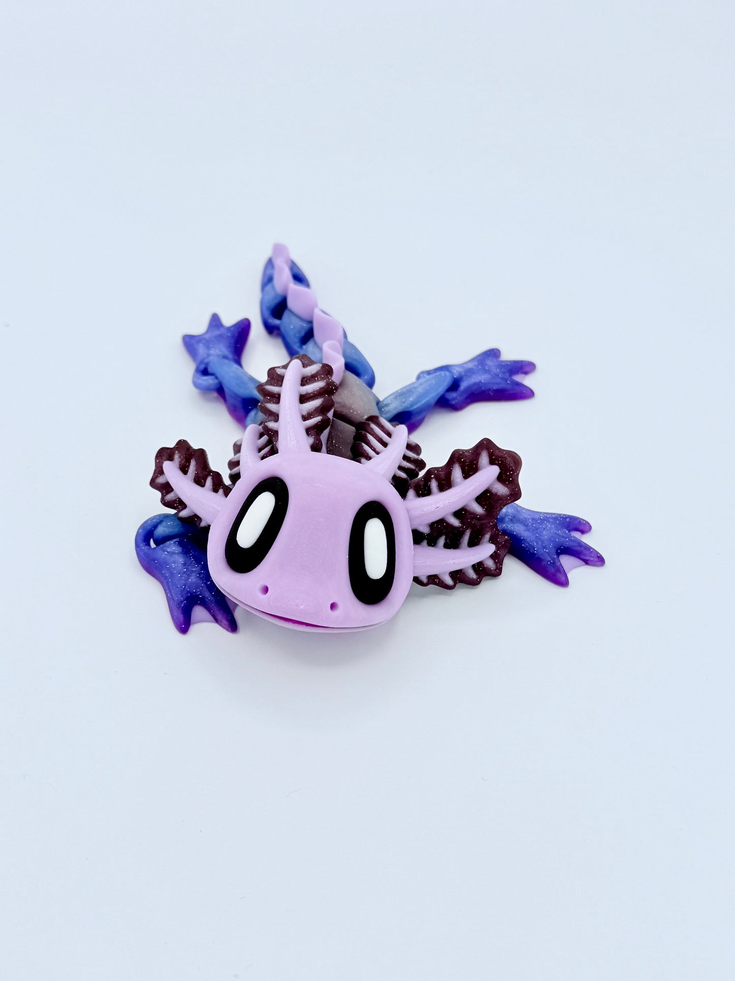 Axolotl with seaweed bed.