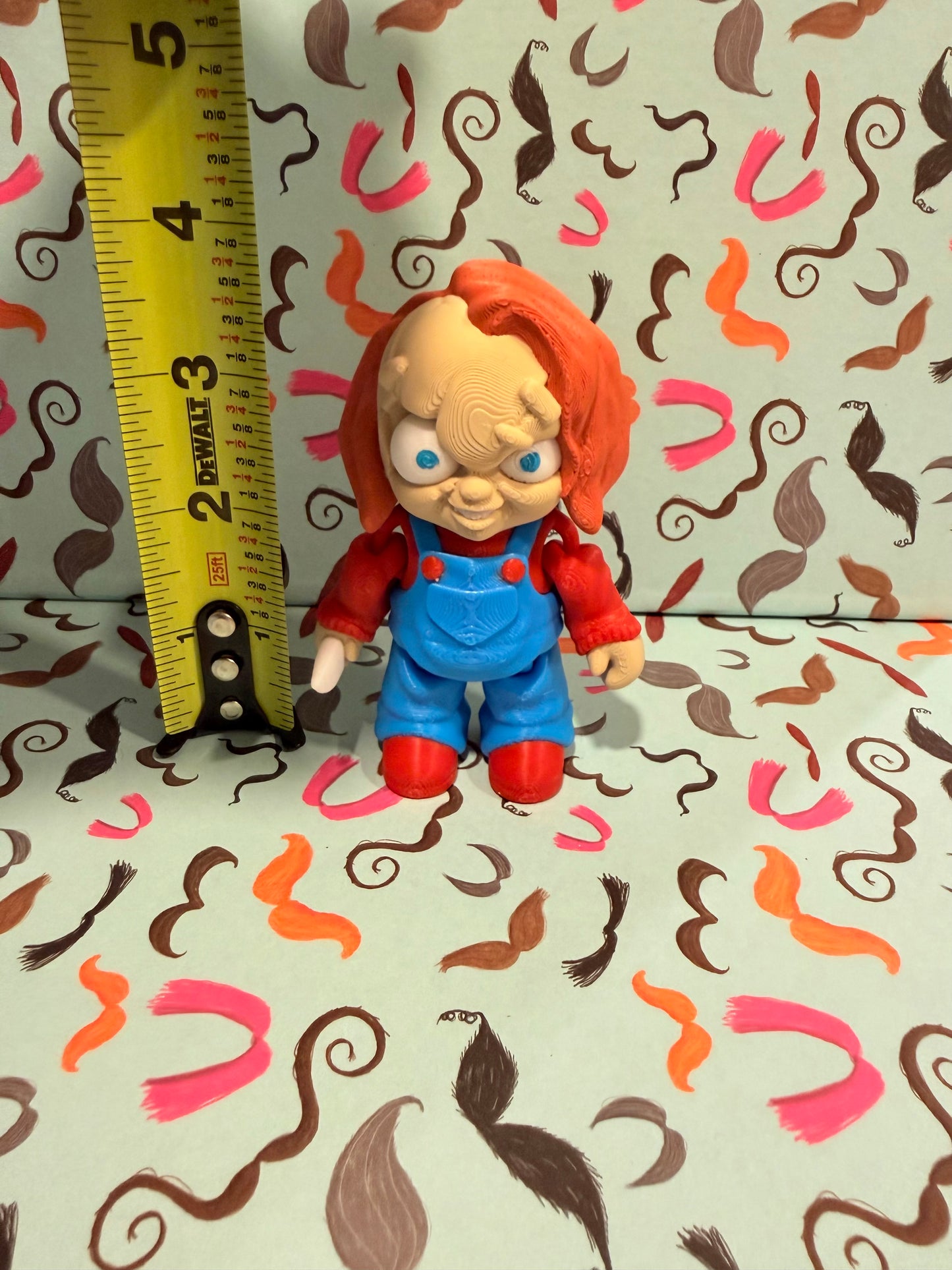 Chucky from child’s play ￼