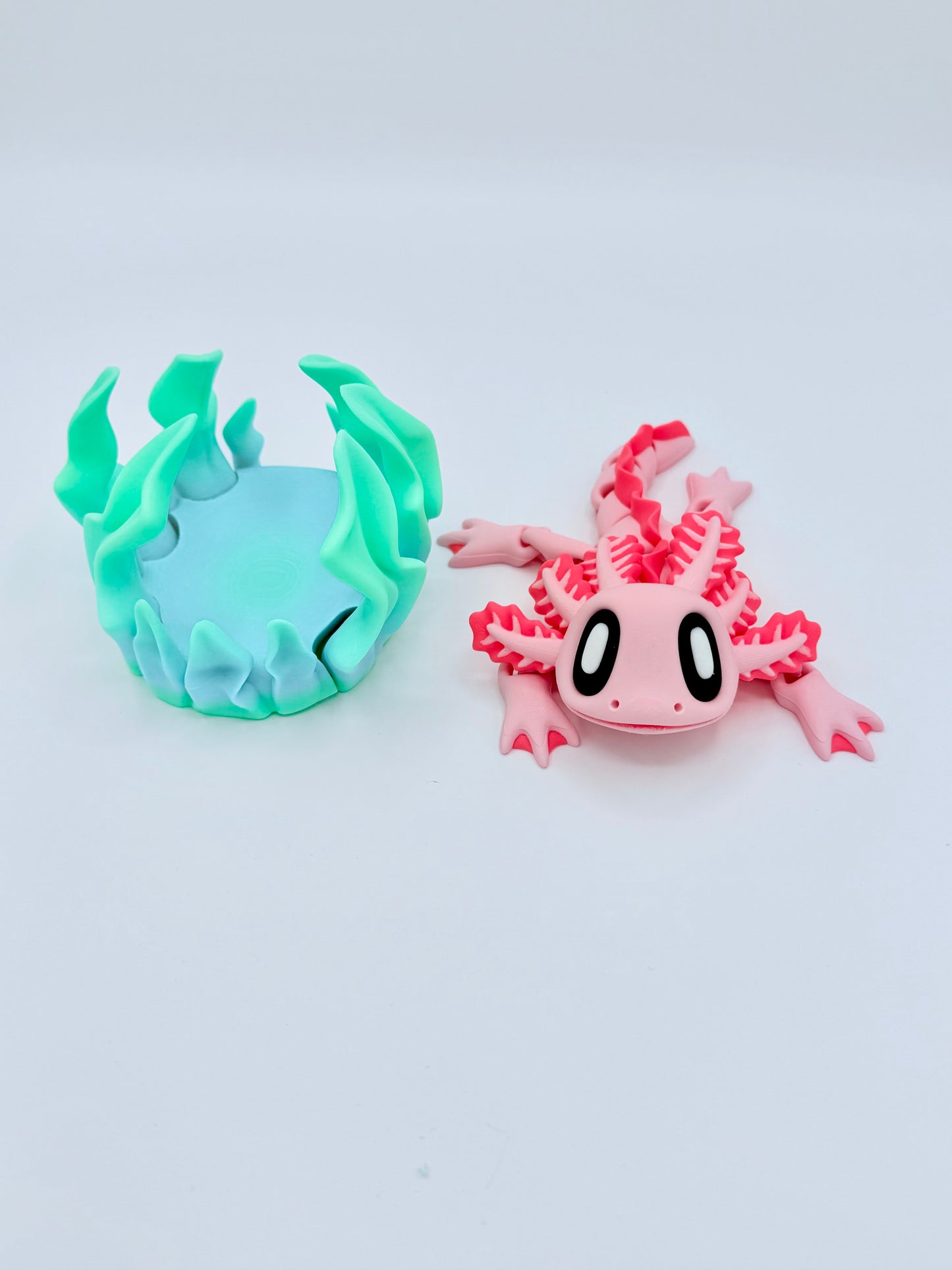 Axolotl with seaweed bed.