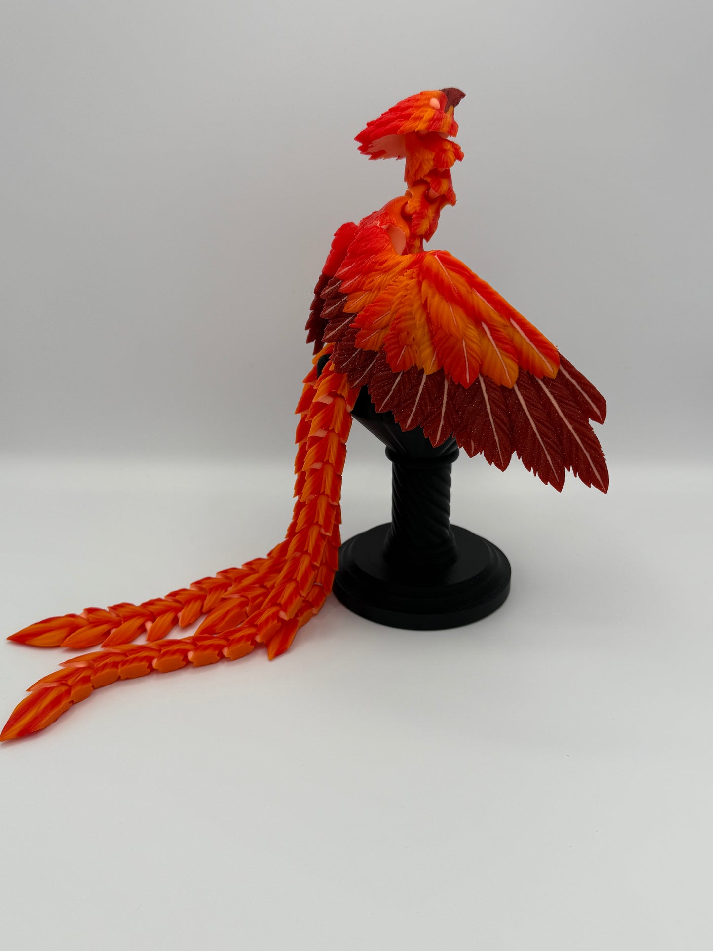 Phoenix for your articulating UV reactive with glow-in-the-dark colors and stand.